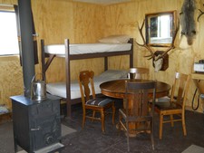 The wood stove keeps this cabin warm and comfortable for our hunters.